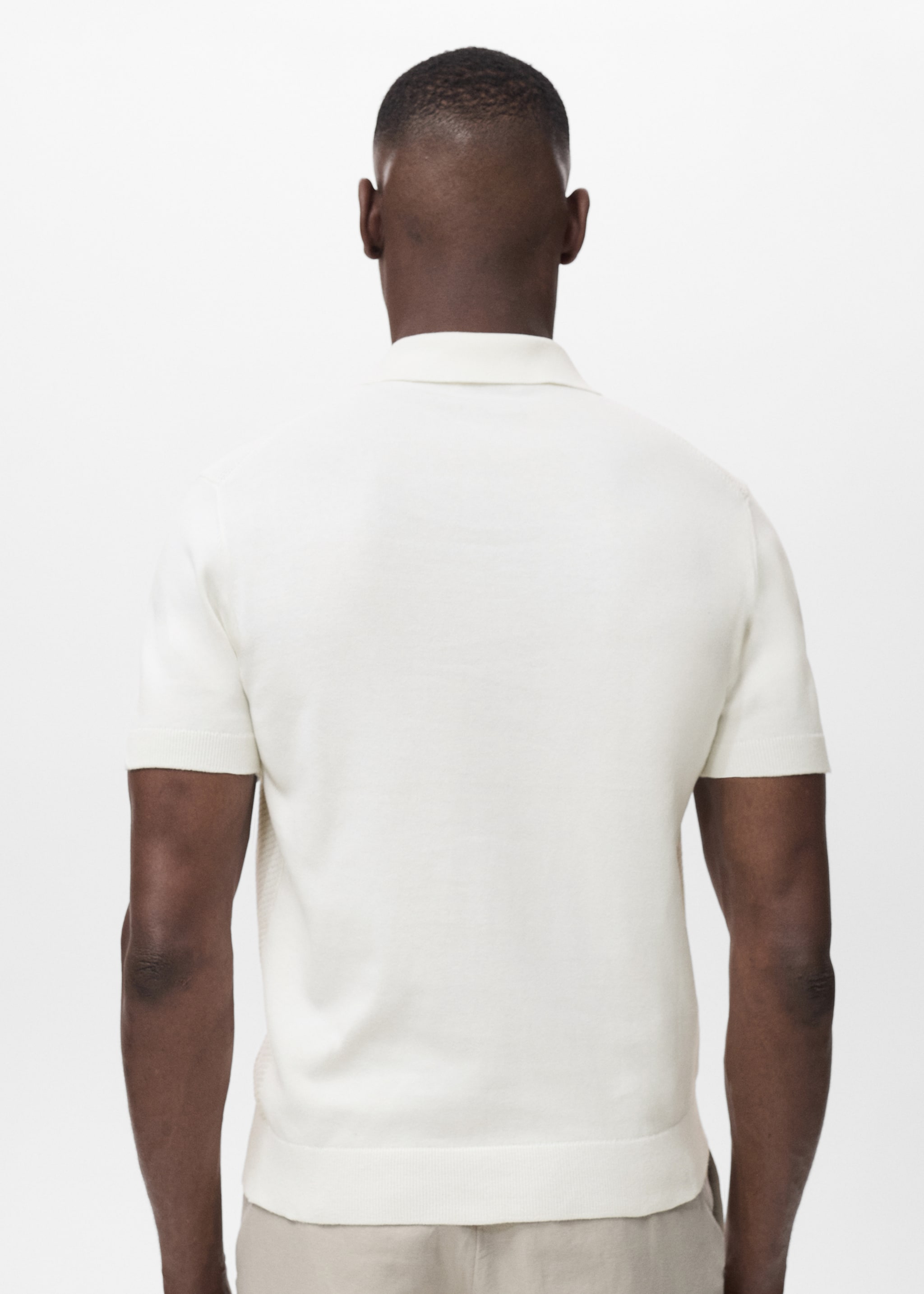 Openwork knitted polo shirt with zipper - Reverse of the article